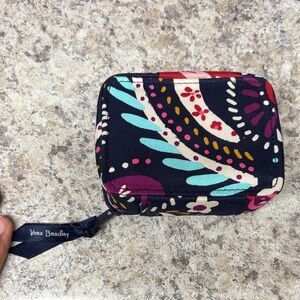 Vera Bradley travel pill case in the "Painted Paisley" pattern.